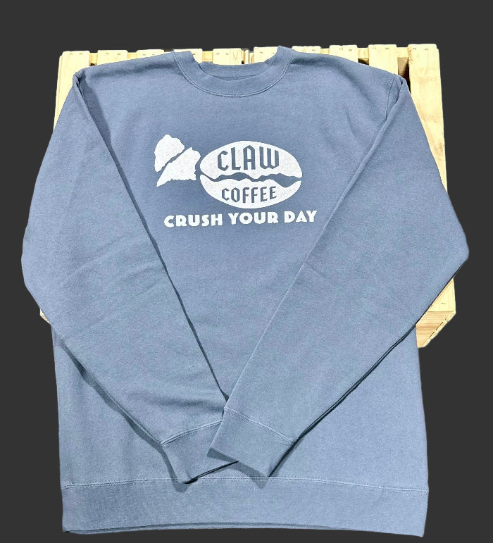 Blue sweatshirt with Claw Coffee logo and "Crush Your Day" text.